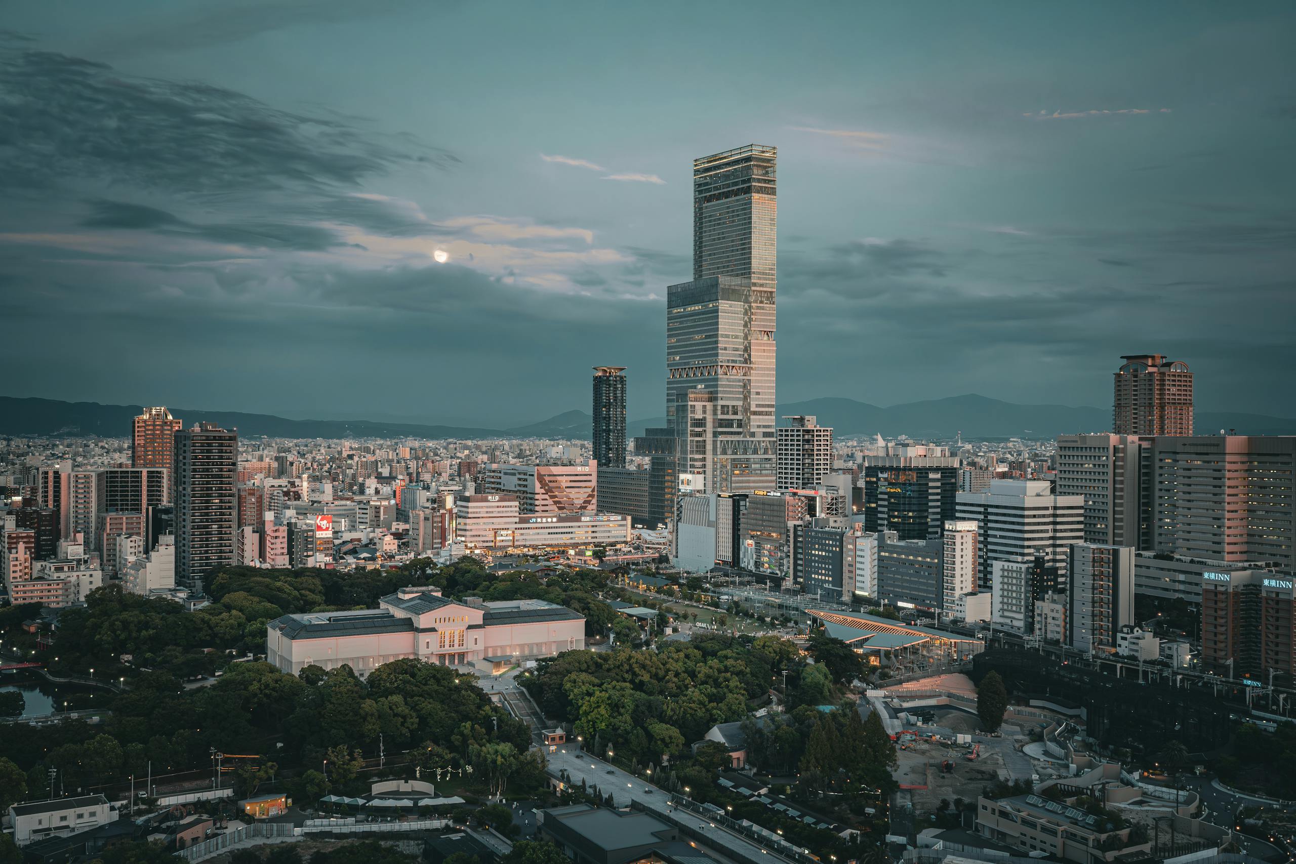 Captivating skyline of Osaka featuring Abeno Harukas at twilight, showcasing Japan's modern architecture.